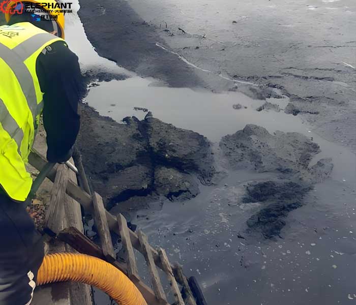 desilting robot removing compacted sludge in sedimentation tank
