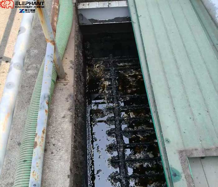 industrial sludge cleaning robot in confined wastewater tank environment