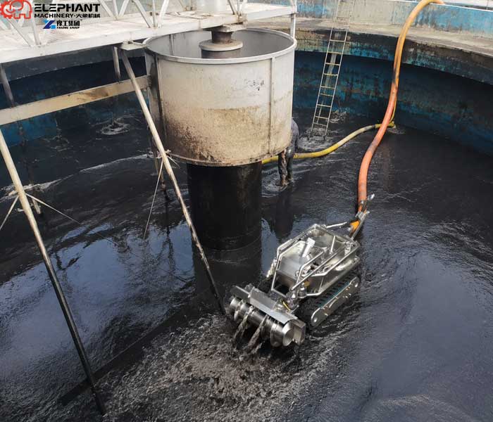 remote dredging robot working in sewage treatment plant basin