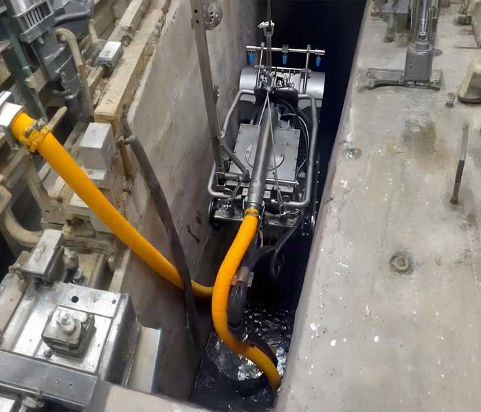 reservoir desilting robot removing sediment in a hydropower reservoir