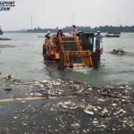 How to Remove Floating Waste from Rivers and Lakes: Methods, Challenges and Automated Solutions river cleaning boat collecting plastic bottles and floating debris with conveyor system