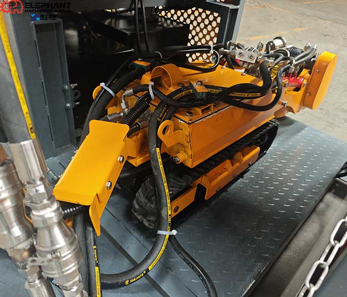 Crawler drainage cleaning robot moving through sediment inside underground drainage channels