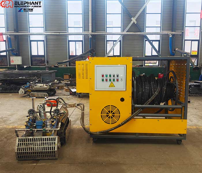 Operator controlling a remote controlled dredging robot for safe sludge removal