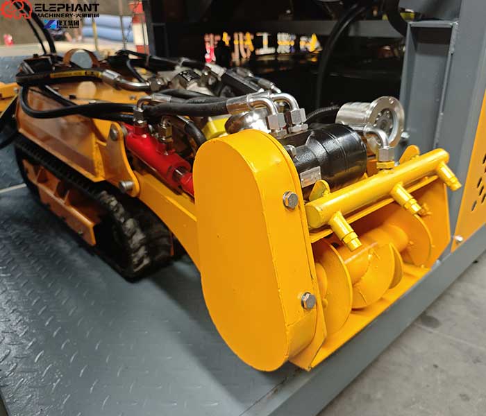 Operator controlling a remote controlled storm drain cleaning robot for safe sediment removal