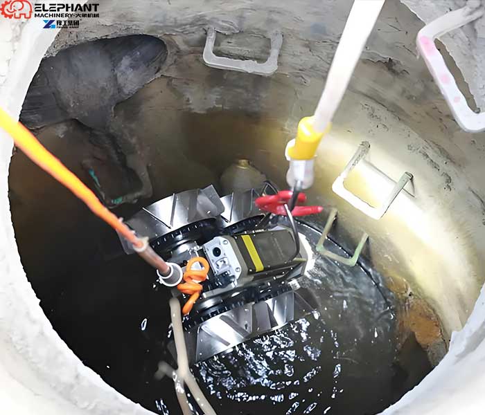 Underground pump station sludge removal robot for confined areas