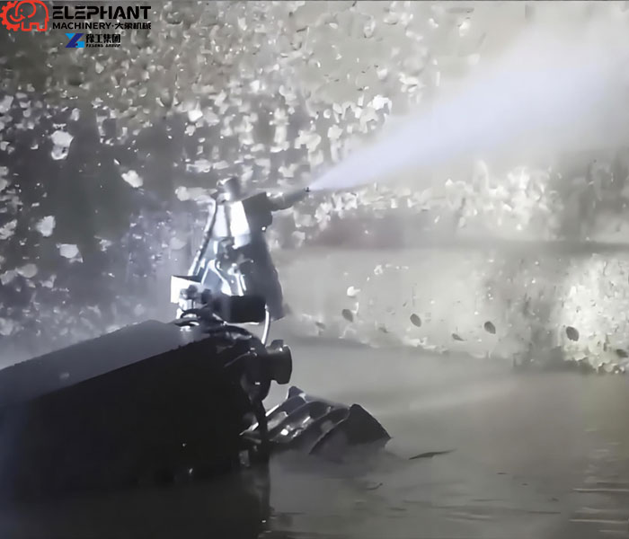 Dredging robot loosening accumulated sludge with a water jet