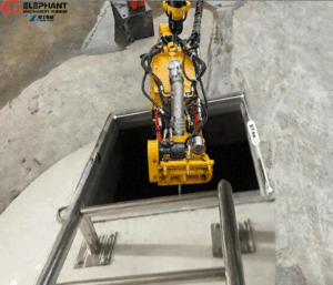 Portable robotic dredge for narrow-access industrial tank cleaning project in Brunei