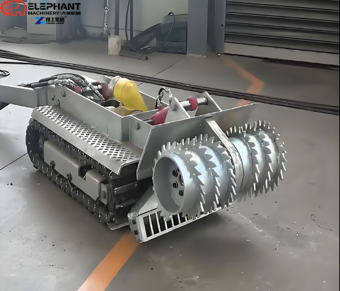 Cutting tool breaking up thick sludge for easier pumping