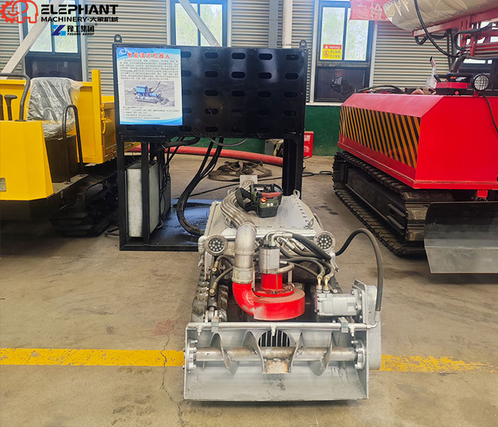Remote-controlled robot for wastewater tank sludge removal